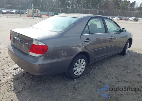 2005 Toyota Camry Le z USA, uszkodzony, nr VIN 4T1BE30KX5U507500